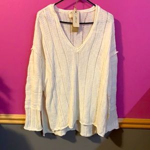 Never worn tags attached! Super cute cream light sweater. Selling reason to big!